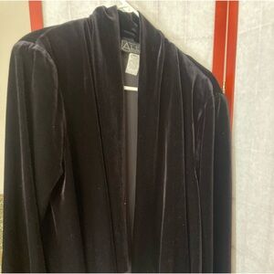 Feels like velour jacket/sweater.